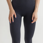 Raeya Fit's best-selling Waist Snatch leggings, perfect for those seeking comfortable, affordable, and sustainable black leggings. These ultra high-waisted leggings feature a 25" inseam, a double-band to flatten the stomach, and a rubber band at the top to snatch the waist. Made from eco-friendly fabric using post-consumer recycled content, they offer both style and sustainability, making them an ideal choice for women looking for the perfect leggings.